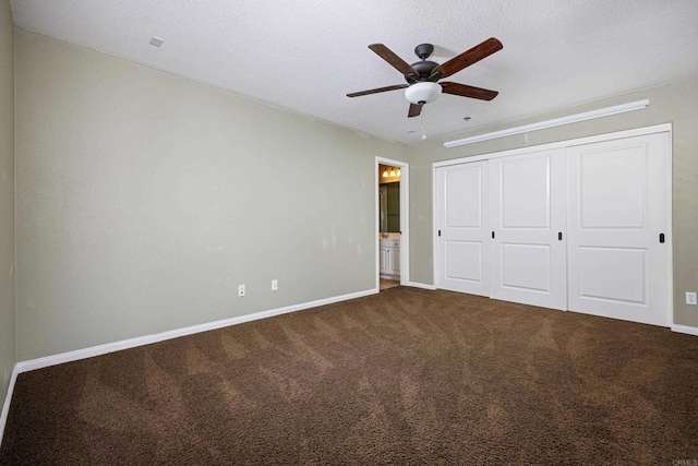 27002 Red Maple St, Murrieta, CA 92562 - unfurnished bedroom with dark carpet, a closet, and a ceiling fan