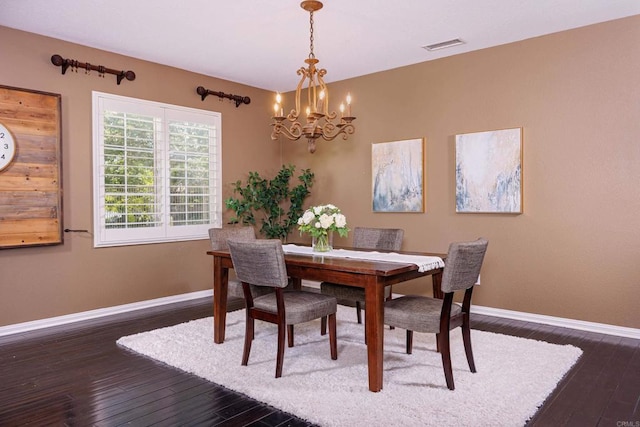 27002 Red Maple St, Murrieta, CA 92562 - dining room featuring a chandelier and dark wood-type flooring