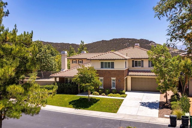 27002 Red Maple St, Murrieta, CA 92562 - mediterranean / spanish house featuring a chimney, stucco siding, and a mountain view
