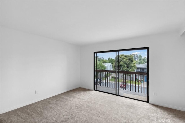 10249 Black Mountain Rd Unit Q3, San Diego, CA 92126 - carpeted spare room featuring baseboards