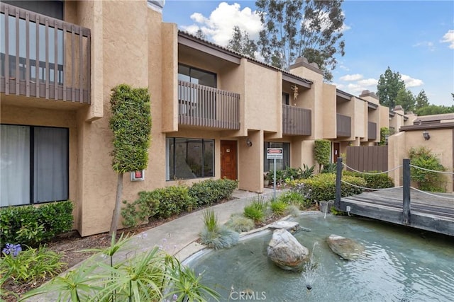 10249 Black Mountain Rd Unit Q3, San Diego, CA 92126 - view of home's community with a garden pond