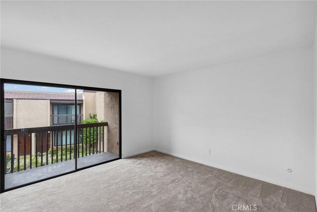 10249 Black Mountain Rd Unit Q3, San Diego, CA 92126 - unfurnished room featuring carpet floors and plenty of natural light