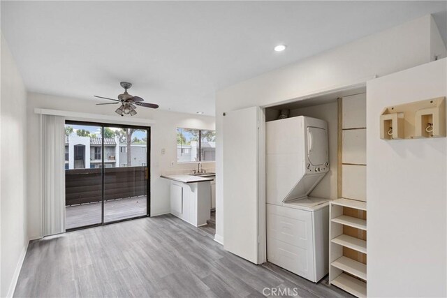 10249 Black Mountain Rd Unit Q3, San Diego, CA 92126 - laundry area with stacked washer / dryer, ceiling fan, wood finished floors, and recessed lighting