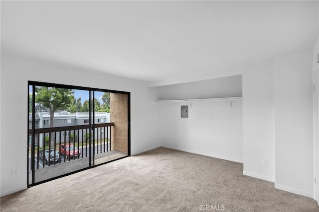 10249 Black Mountain Rd Unit Q3, San Diego, CA 92126 - unfurnished room with carpet flooring and baseboards