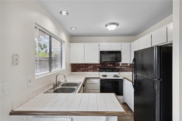 10249 Black Mountain Rd Unit Q3, San Diego, CA 92126 - kitchen featuring black appliances, a peninsula, tile countertops, tasteful backsplash, and recessed lighting
