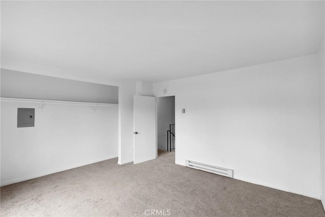 10249 Black Mountain Rd Unit Q3, San Diego, CA 92126 - carpeted spare room featuring a baseboard heating unit and electric panel