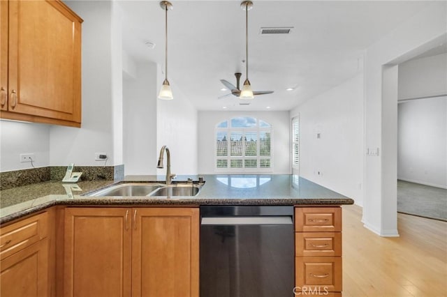 3887 Pell Pl Unit 414, San Diego, CA 92130 - kitchen with dishwashing machine, ceiling fan, a peninsula, dark stone countertops, and brown cabinets