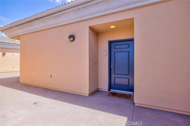 3887 Pell Pl Unit 414, San Diego, CA 92130 - view of exterior entry featuring stucco siding