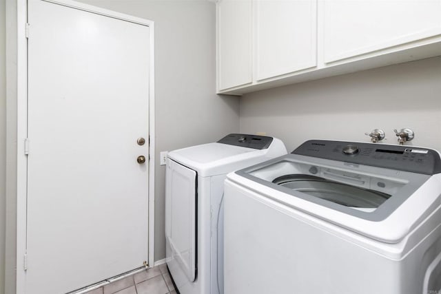 30602 Colina Verde St, Temecula, CA 92592 - laundry room featuring washer and clothes dryer, cabinet space, and light tile patterned floors