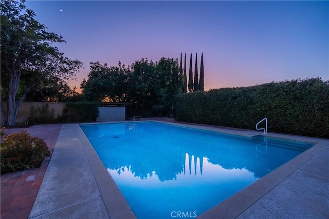 3131 E Cortez St, West Covina, CA 91791 - pool at dusk featuring a fenced backyard