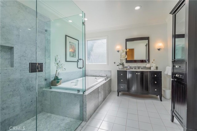 3131 E Cortez St, West Covina, CA 91791 - bathroom with crown molding, a garden tub, vanity, a stall shower, and tile patterned floors