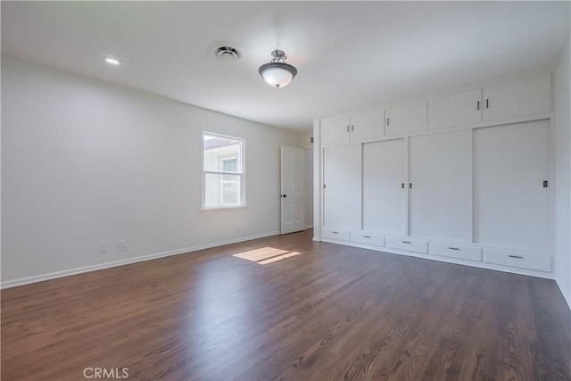 3131 E Cortez St, West Covina, CA 91791 - unfurnished bedroom with dark wood-type flooring and a closet