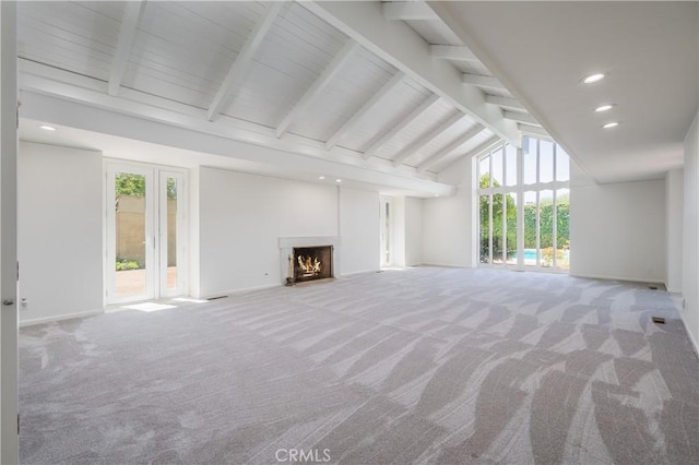 3131 E Cortez St, West Covina, CA 91791 - unfurnished living room featuring carpet flooring, high vaulted ceiling, a warm lit fireplace, plenty of natural light, and beamed ceiling