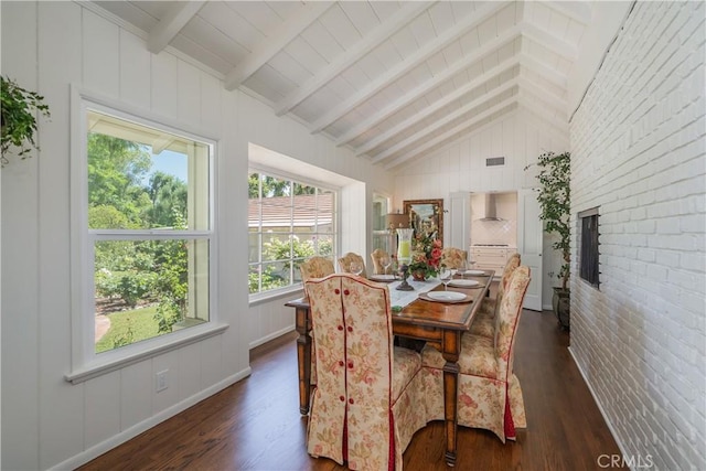 3131 E Cortez St, West Covina, CA 91791 - dining room featuring dark wood-type flooring, a fireplace, and brick wall