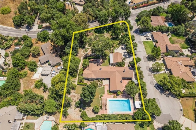 3131 E Cortez St, West Covina, CA 91791 - aerial perspective of suburban area with a pool area and property boundaries highlighted