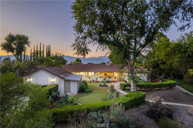 3131 E Cortez St, West Covina, CA 91791 - back of house featuring a yard and board and batten siding