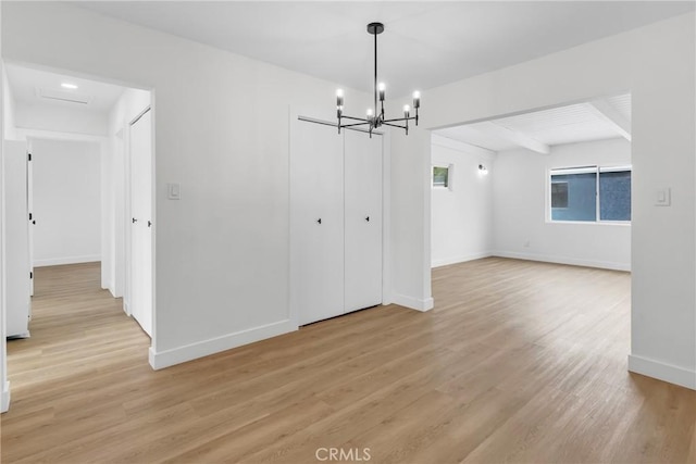 4713 Calada Ave, Pico Rivera, CA 90660 - unfurnished dining area with a chandelier and light wood-style floors