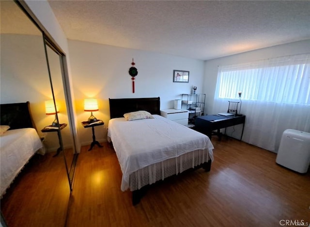 15205 S Budlong Ave Unit 9, Gardena, CA 90247 - bedroom with wood finished floors and a closet