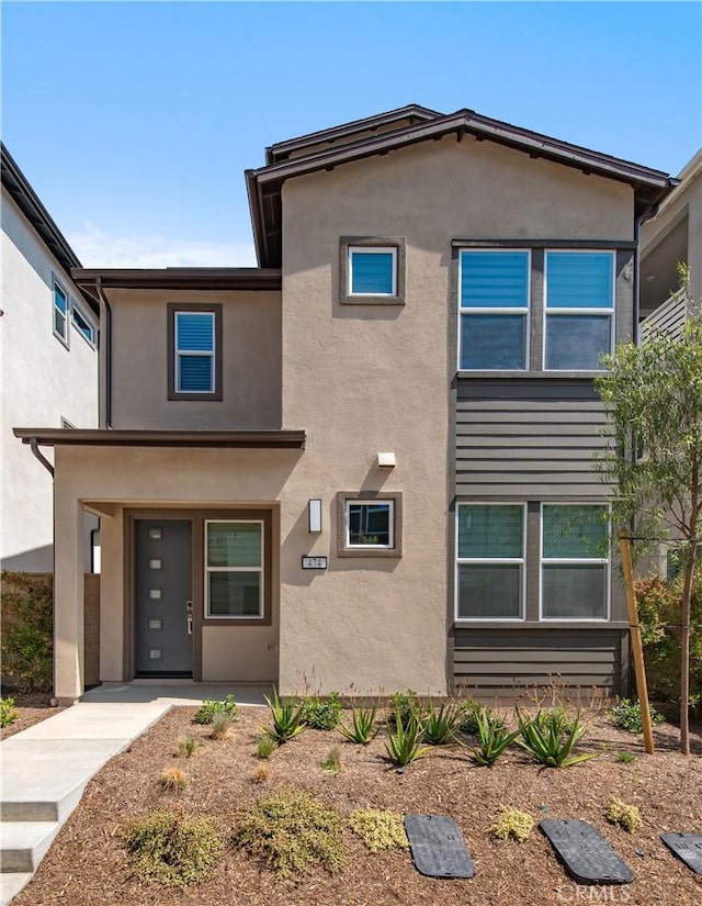 474 Lobata, Irvine, CA 92618 - view of front of home featuring stucco siding