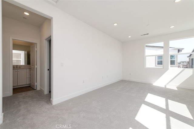 474 Lobata, Irvine, CA 92618 - unfurnished room with light colored carpet and recessed lighting