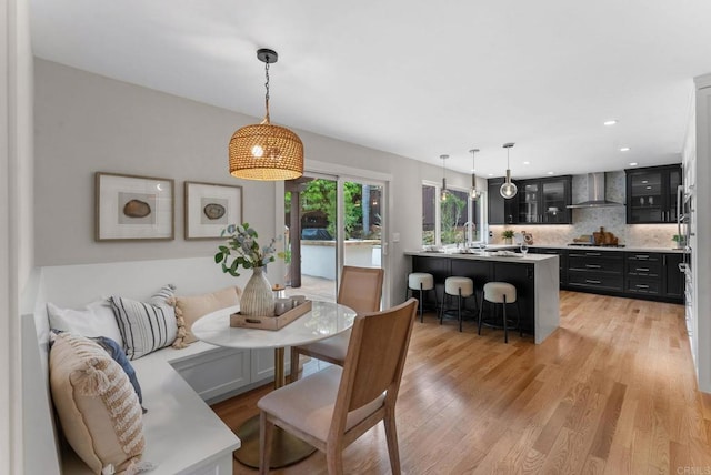 3903 Cadden Way, San Diego, CA 92117 - dining space with light wood-style floors