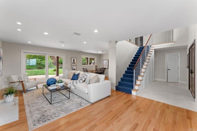 3903 Cadden Way, San Diego, CA 92117 - living room featuring stairs, plenty of natural light, recessed lighting, and light wood-type flooring