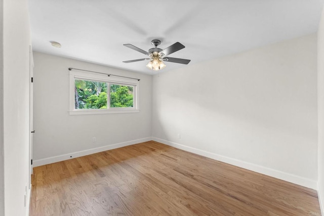 3903 Cadden Way, San Diego, CA 92117 - spare room with light wood-style floors, ceiling fan, and a smoke detector