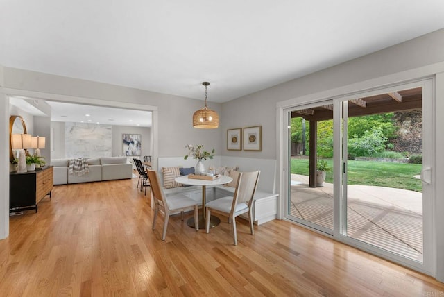 3903 Cadden Way, San Diego, CA 92117 - dining room with light wood-style flooring