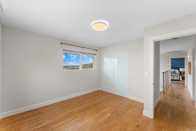 3903 Cadden Way, San Diego, CA 92117 - unfurnished room featuring light wood-style flooring and baseboards