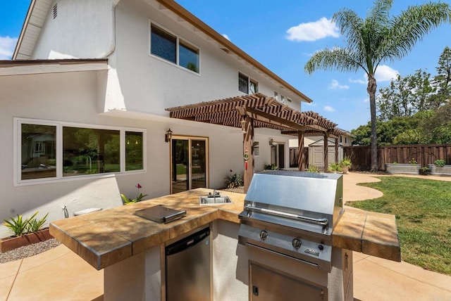 3903 Cadden Way, San Diego, CA 92117 - view of patio / terrace with a storage unit, a pergola, and exterior kitchen