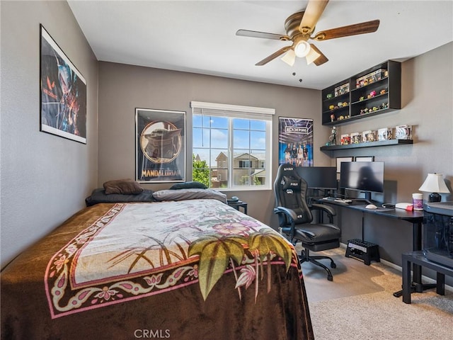 11760 Espola Pl, Victorville, CA 92392 - carpeted bedroom with a desk and ceiling fan