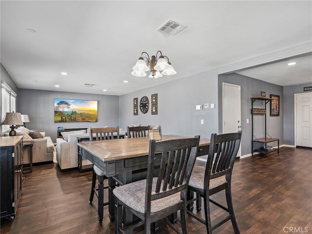 11760 Espola Pl, Victorville, CA 92392 - dining area with dark wood-style floors, a chandelier, and recessed lighting