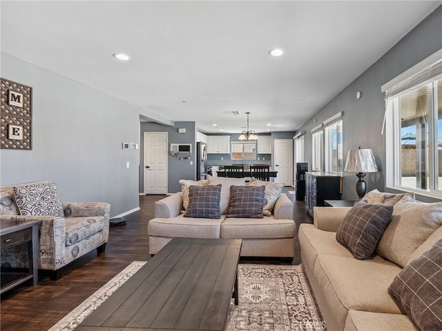 11760 Espola Pl, Victorville, CA 92392 - living room featuring recessed lighting and dark wood finished floors