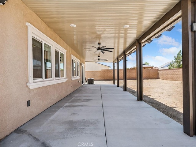 11760 Espola Pl, Victorville, CA 92392 - fenced backyard featuring a patio and ceiling fan