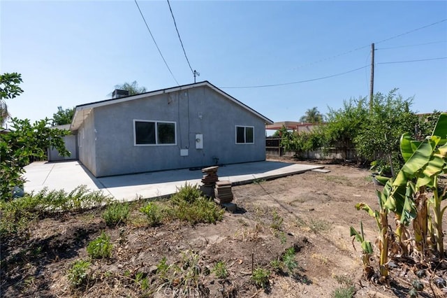 2246 Beachwood Dr, Merced, CA 95348 - rear view of property with a patio, a fenced backyard, and stucco siding
