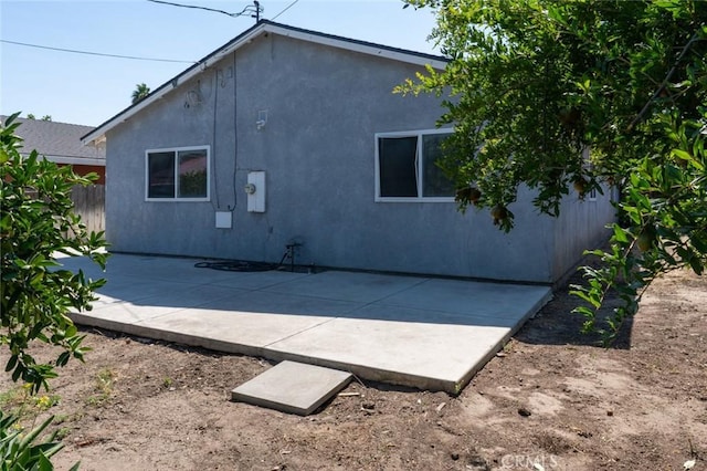 2246 Beachwood Dr, Merced, CA 95348 - view of property exterior featuring stucco siding and a patio area