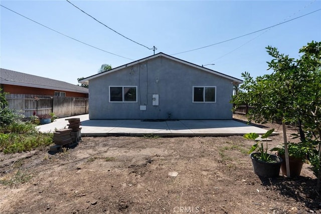 2246 Beachwood Dr, Merced, CA 95348 - back of property featuring stucco siding and a patio area
