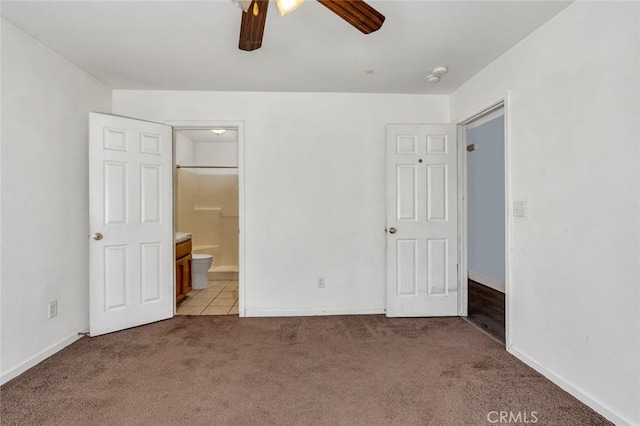 2246 Beachwood Dr, Merced, CA 95348 - unfurnished bedroom featuring light colored carpet, connected bathroom, and ceiling fan