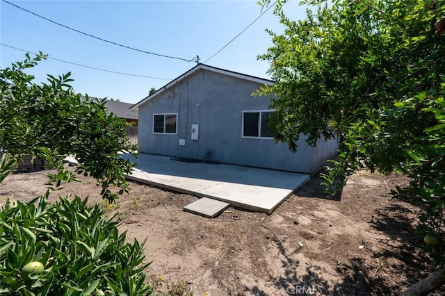 2246 Beachwood Dr, Merced, CA 95348 - rear view of property featuring a patio and stucco siding