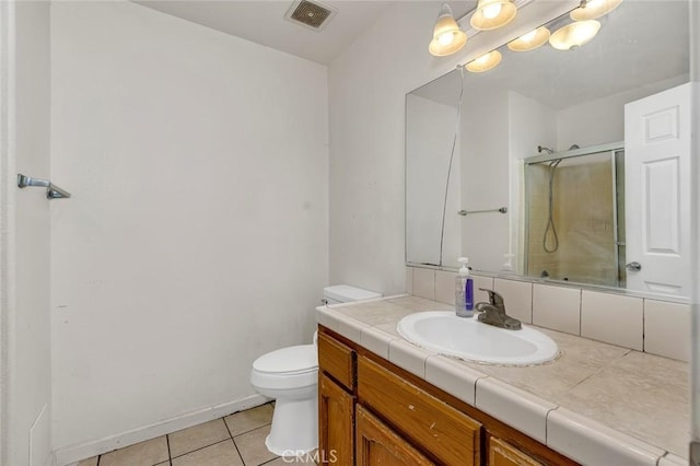 2246 Beachwood Dr, Merced, CA 95348 - bathroom with vanity, tile patterned flooring, and a shower with shower door