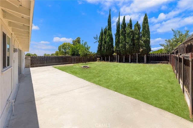 1851 S San Antonio Ave, Pomona, CA 91766 - fenced backyard featuring a patio and a fire pit