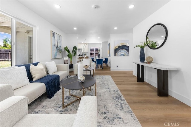 1851 S San Antonio Ave, Pomona, CA 91766 - living room with wood finished floors and recessed lighting