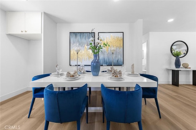 1851 S San Antonio Ave, Pomona, CA 91766 - dining space with light wood finished floors and recessed lighting