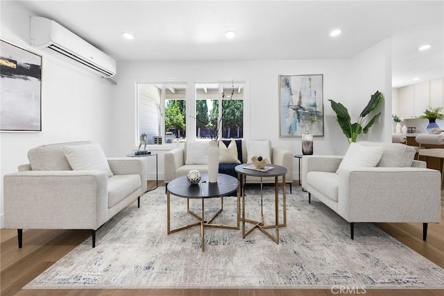 1851 S San Antonio Ave, Pomona, CA 91766 - living area featuring an AC wall unit, wood finished floors, and recessed lighting