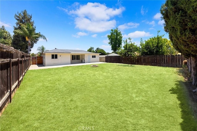 1851 S San Antonio Ave, Pomona, CA 91766 - fenced backyard featuring a patio