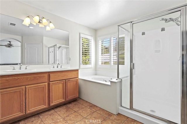 27664 Cordovan Dr, Canyon Country, CA 91351 - bathroom featuring a stall shower, double vanity, a garden tub, and tile patterned floors