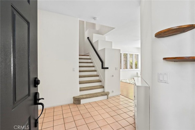 27664 Cordovan Dr, Canyon Country, CA 91351 - foyer entrance featuring stairway and tile patterned flooring