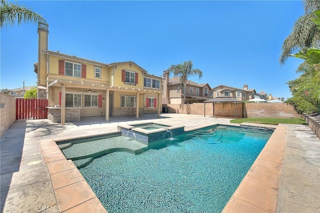 12790 Golden Leaf Dr, Rancho Cucamonga, CA 91739 - view of swimming pool featuring a patio, a fenced backyard, a gazebo, and a pool with connected hot tub