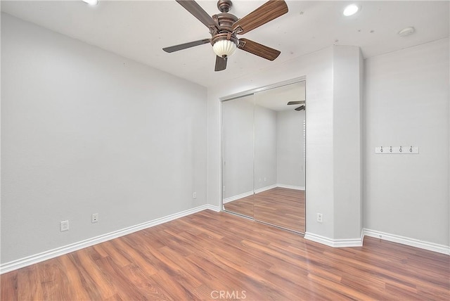 12790 Golden Leaf Dr, Rancho Cucamonga, CA 91739 - unfurnished bedroom with wood finished floors, a closet, recessed lighting, and ceiling fan