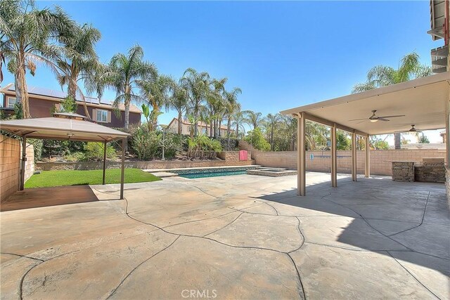 12790 Golden Leaf Dr, Rancho Cucamonga, CA 91739 - fenced backyard featuring a ceiling fan, a gazebo, a patio, and a pool with connected hot tub